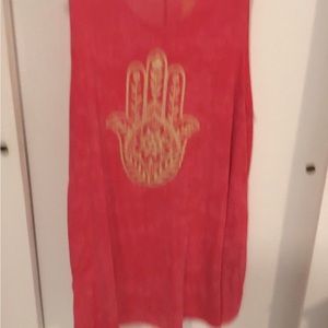 Light top with gold hand of God